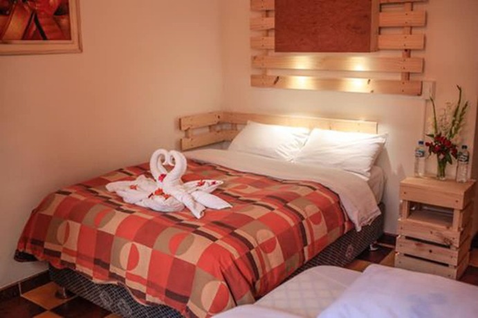 Imagen de la habitación del Hotel Kuychipunku Hostal. Foto 11