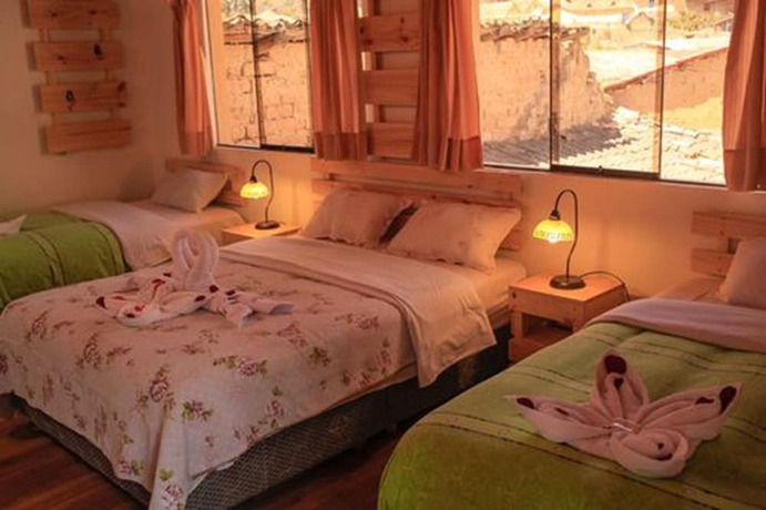Imagen de la habitación del Hotel Kuychipunku Hostal. Foto 12