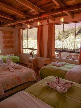 Imagen de la habitación del Hotel Kuychipunku Hostal. Foto 13
