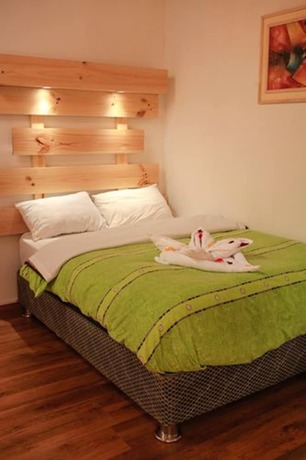 Imagen de la habitación del Hotel Kuychipunku Hostal. Foto 17
