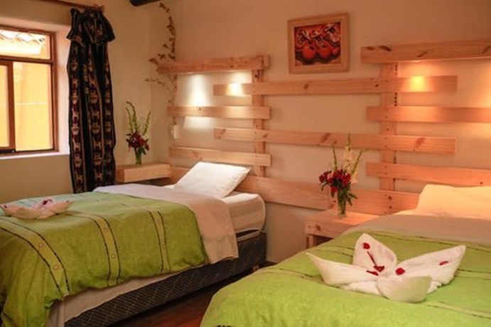 Imagen de la habitación del Hotel Kuychipunku Hostal. Foto 18