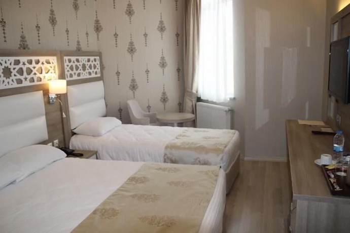 Imagen de la habitación del Hotel Kuzey Yildizi. Foto 8