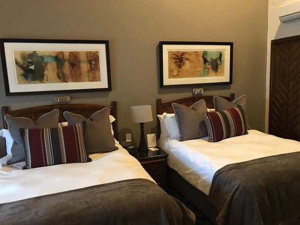 Imagen de la habitación del Hotel Kwa Maritane Self-Catering Chalets. Foto 8