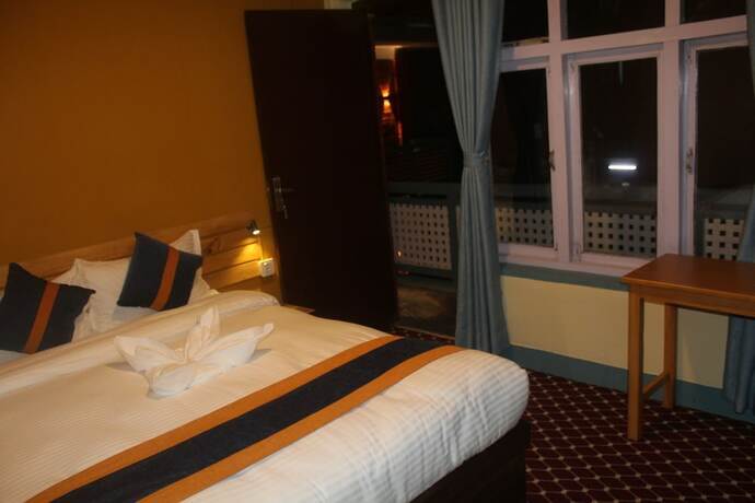Imagen de la habitación del Hotel Kwabahal Boutique hostel. Foto 11