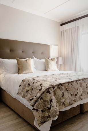 Imagen de la habitación del Hotel Kyalami Creek Luxury Apartments. Foto 16