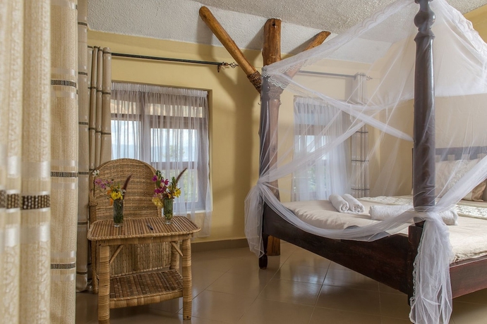 Imagen de la habitación del Hotel Kyaninga Royal Cottage. Foto 9