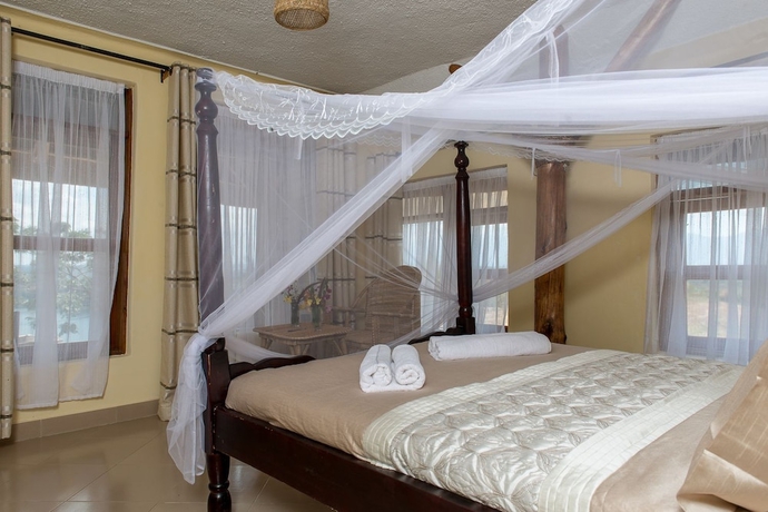 Imagen de la habitación del Hotel Kyaninga Royal Cottage. Foto 10