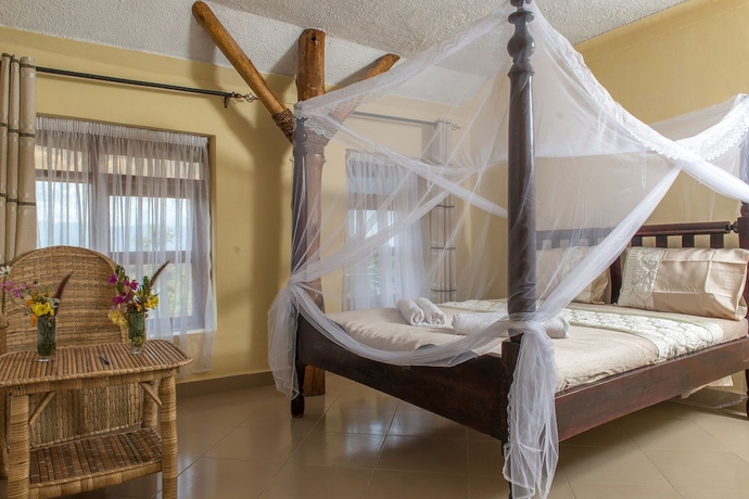 Imagen de la habitación del Hotel Kyaninga Royal Cottage. Foto 11