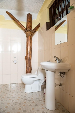 Imagen de la habitación del Hotel Kyaninga Royal Cottage. Foto 15