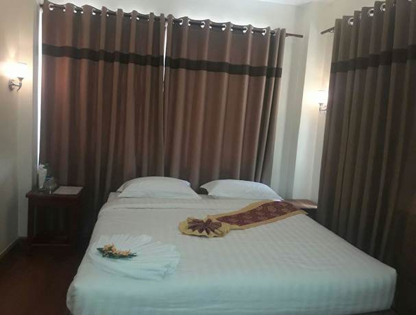 Imagen de la habitación del Hotel Kyaw Myanmar. Foto 11