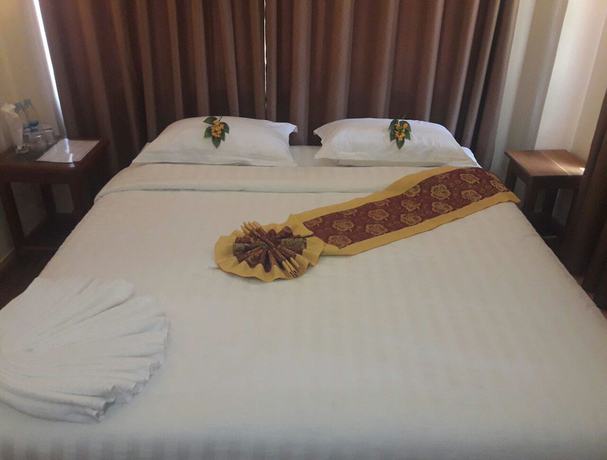 Imagen de la habitación del Hotel Kyaw Myanmar. Foto 12