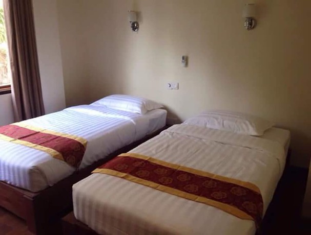 Imagen de la habitación del Hotel Kyaw Myanmar. Foto 14