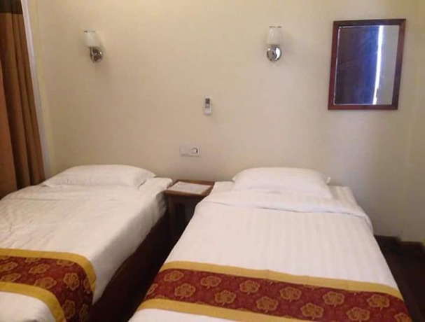 Imagen de la habitación del Hotel Kyaw Myanmar. Foto 16