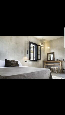 Imagen de la habitación del Hotel Kymata Bohemian Beach Resort. Foto 15