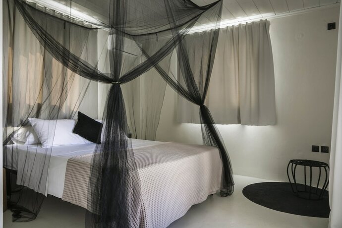 Imagen de la habitación del Hotel Kymata Bohemian Beach Resort. Foto 18