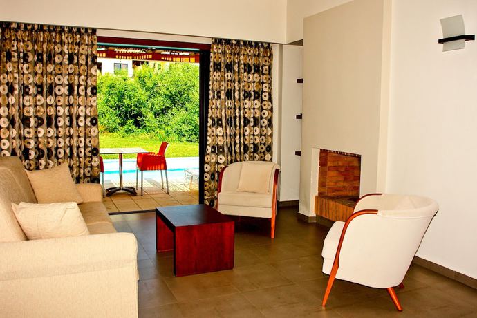 Imagen de la habitación del Hotel Kymi Palace. Foto 13