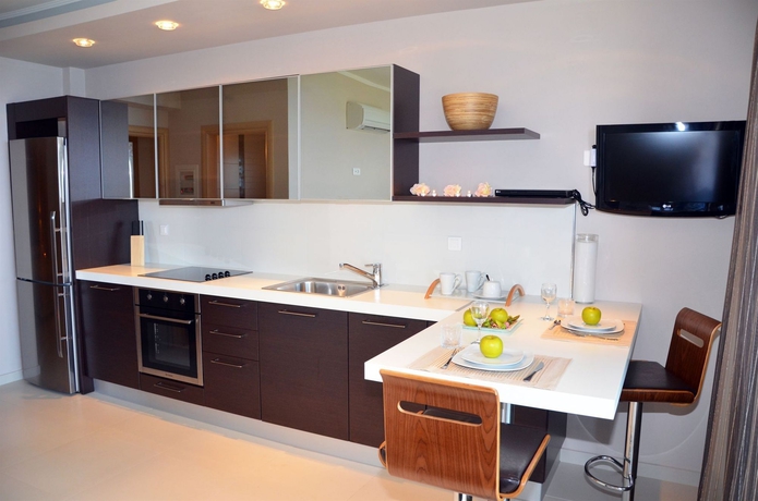 Imagen de la habitación del Hotel Kymothoe Elite Suites. Foto 4