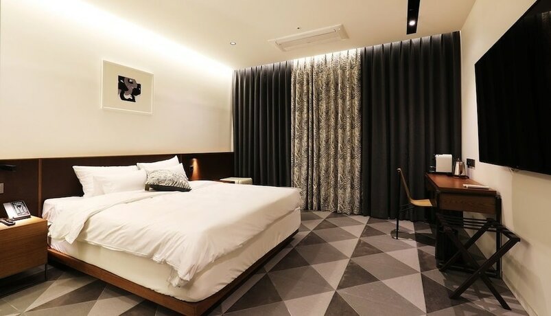 Imagen de la habitación del Hotel Kynd Hotel. Foto 33