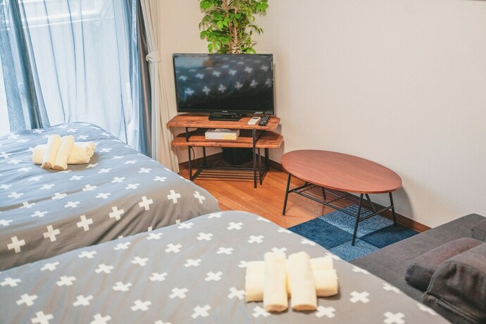 Imagen de la habitación del Hotel Kyobashi Base. Foto 14