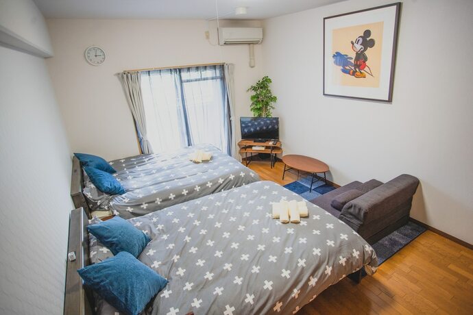 Imagen de la habitación del Hotel Kyobashi Base. Foto 16