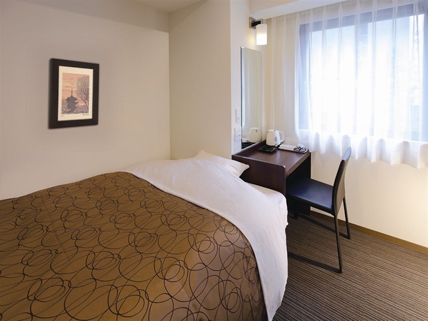 Imagen de la habitación del Hotel Kyoto Base. Foto 9