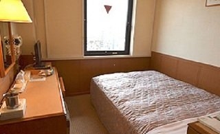 Imagen de la habitación del Hotel Kyoto Horikawa Inn. Foto 11