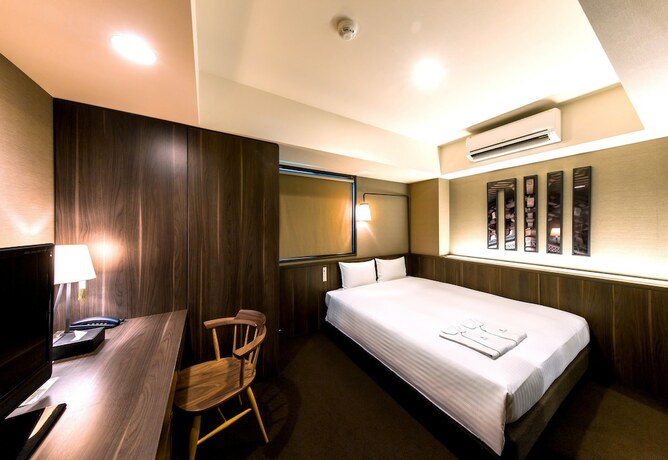 Imagen de la habitación del Hotel Kyoto Itoya. Foto 15