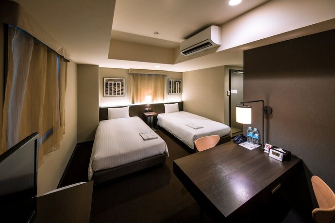 Imagen de la habitación del Hotel Kyoto Itoya. Foto 21