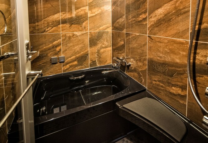 Imagen de la habitación del Hotel Kyoto Karasuma Oike Grandereverie. Foto 18