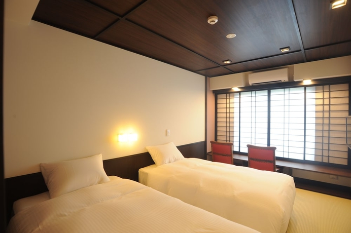 Imagen de la habitación del Hotel Kyoto Takasegawa Bettei. Foto 13