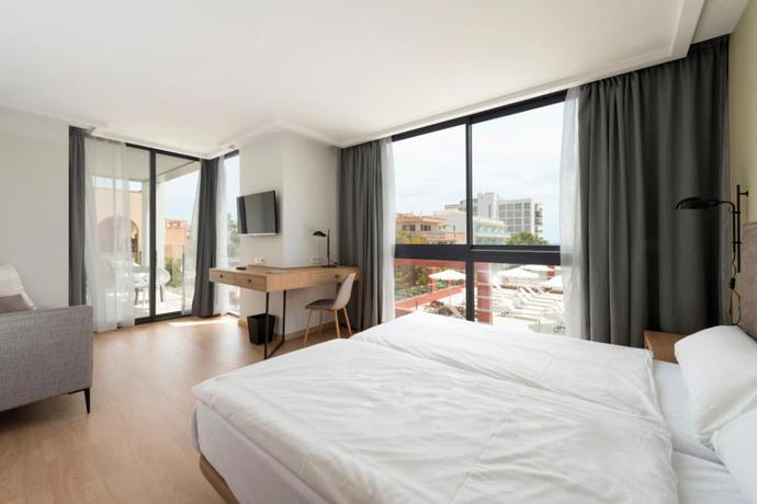 Imagen de la habitación del Hotel Kyrat Amarac Suites. Foto 12