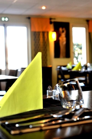 Imagen del bar/restaurante del Hotel Kyriad Annecy Sud - Cran Gevrier. Foto 3