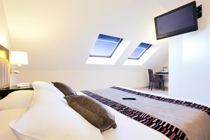 Imagen de la habitación del Hotel Kyriad Belfort Centre Gare. Foto 2