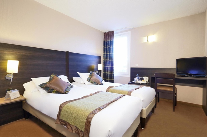 Imagen de la habitación del Hotel Kyriad Belfort Centre Gare. Foto 10