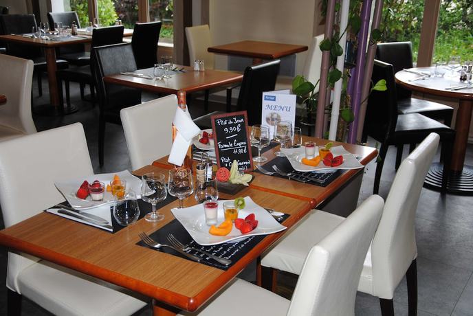 Imagen del bar/restaurante del Hotel Kyriad Bellegarde - Gen&egrave;ve. Foto 3