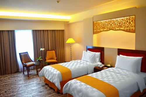 Imagen de la habitación del Hotel Kyriad Bumiminang. Foto 6
