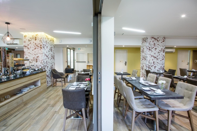 Imagen del bar/restaurante del Hotel Kyriad Chambéry Centre - Curial. Foto 1