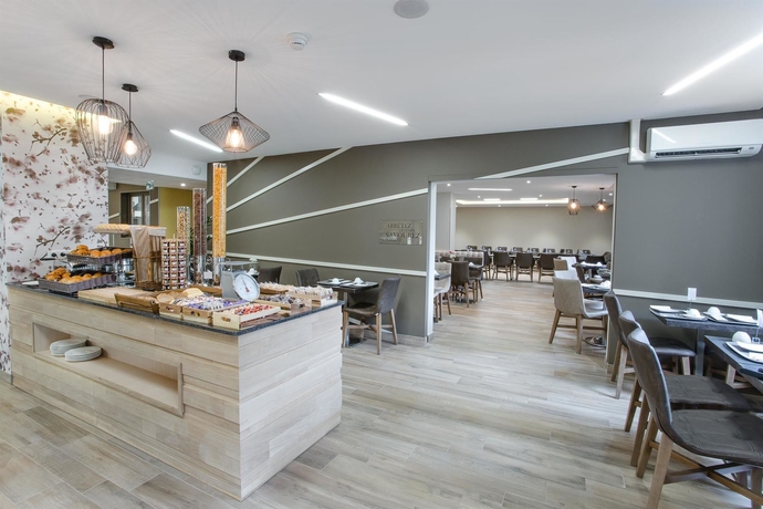 Imagen del bar/restaurante del Hotel Kyriad Chambéry Centre - Curial. Foto 2