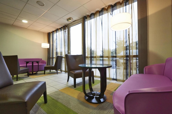 Imagen del bar/restaurante del Hotel Kyriad Clermont-ferrand-sud-la Pardieu. Foto 3