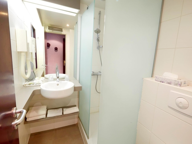 Imagen de la habitación del Hotel Kyriad - Deauville St Arnoult. Foto 13