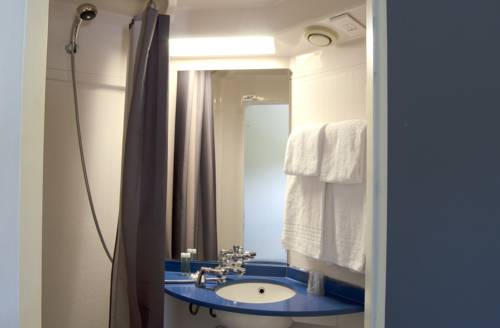 Imagen de la habitación del Hotel Kyriad Direct Chilly Mazarin. Foto 3