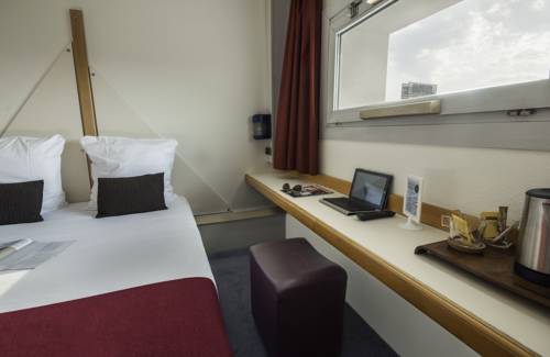 Imagen de la habitación del Hotel Kyriad Direct Chilly Mazarin. Foto 9