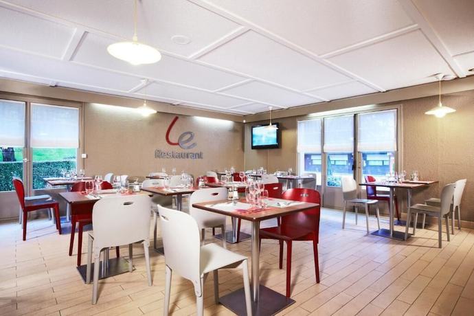 Imagen del bar/restaurante del Hotel Kyriad Direct Le Havre Est - Gonfreville. Foto 2