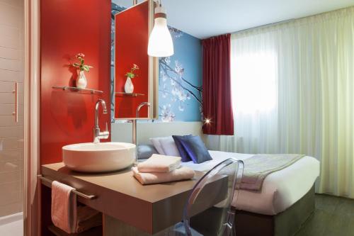 Imagen de la habitación del Hotel Kyriad Direct Rennes Ouest. Foto 19