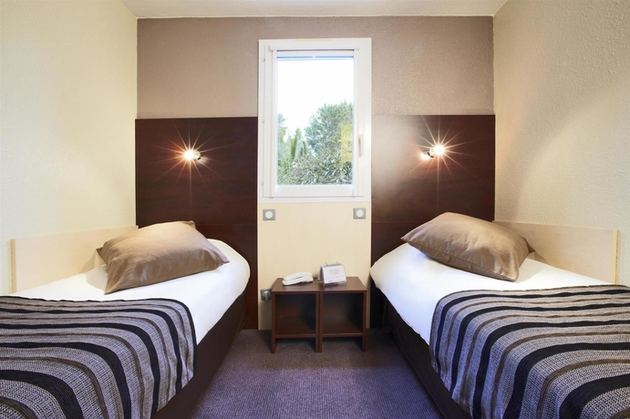 Imagen de la habitación del Hotel Kyriad ECO - Perpignan Nord A&eacute;roport. Foto 11