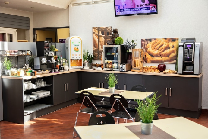 Imagen del bar/restaurante del Hotel Kyriad Eco Lille Sud. Foto 3