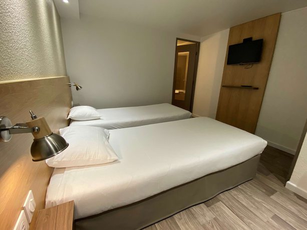 Imagen de la habitación del Hotel Kyriad Fontenay Tresigny. Foto 14