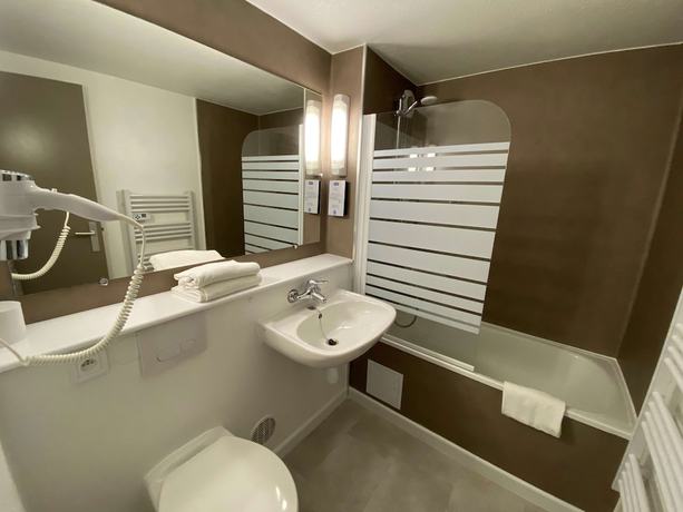 Imagen de la habitación del Hotel Kyriad Fontenay Tresigny. Foto 18