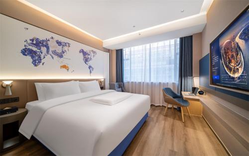 Imagen de la habitación del Hotel Kyriad Foshan Nanhai Guangfo Smart City. Foto 13