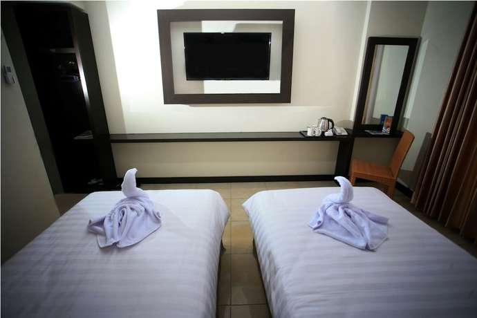 Imagen de la habitación del Hotel Kyriad Grand Master Purwodadi. Foto 4